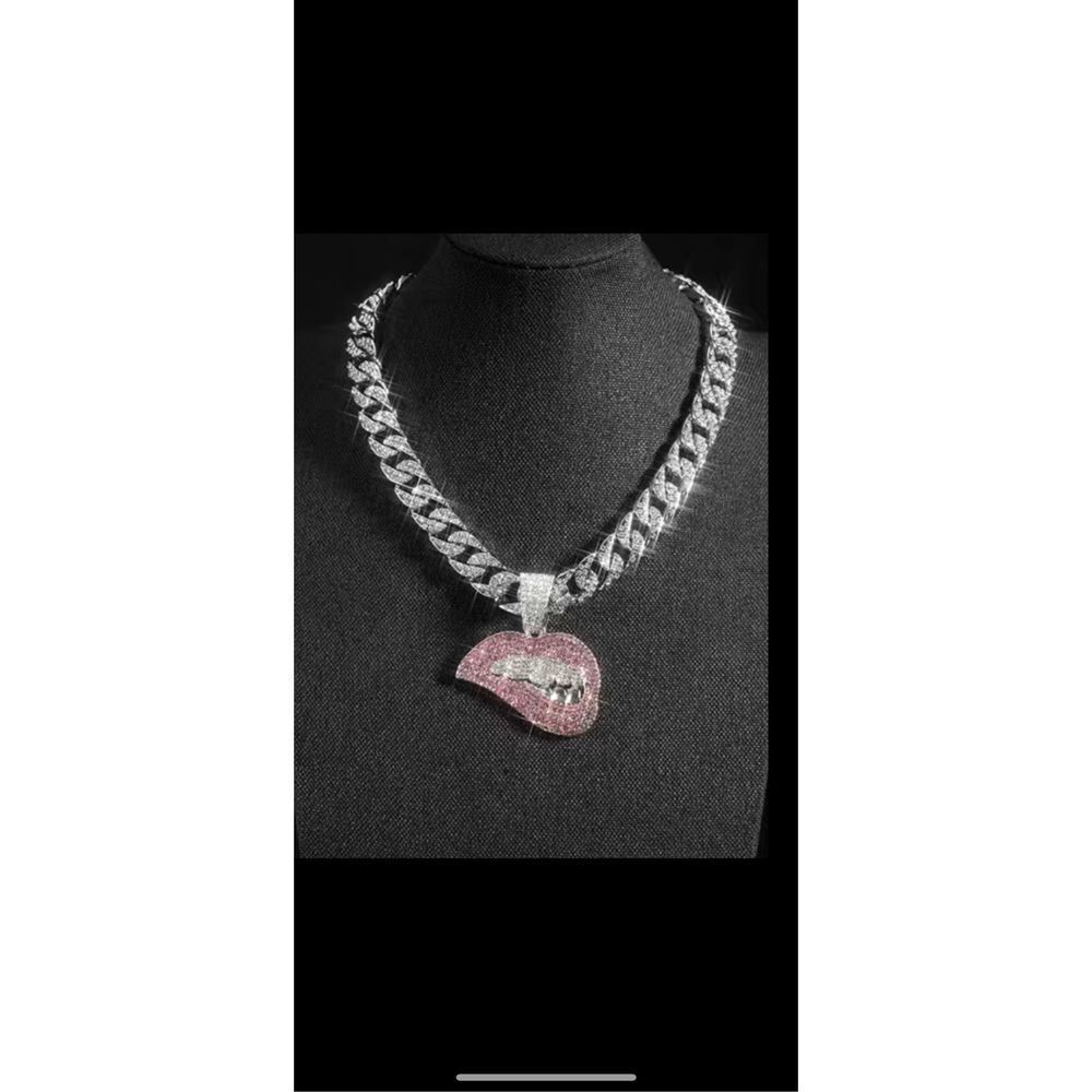 Gorgeous pink lip necklace.
